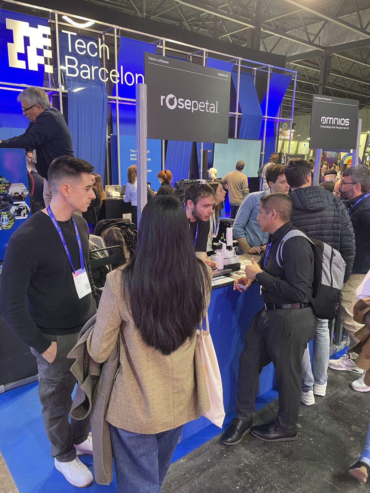 Rosepetal AI team engaging with visitors at the 4YFN Talent Arena stand.